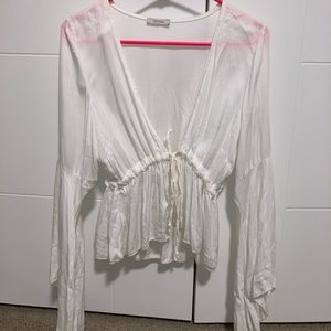 White long sleeved flowy top with front tie